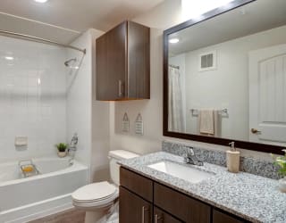 Granite Counters and Framed Mirrors in North Austin