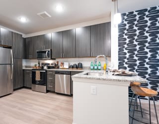 the heights on capitol hill apartments kitchen with stainless steel appliances