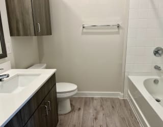 a bathroom with a toilet sink and bathtub