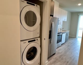 a laundry room with a washer and dryer