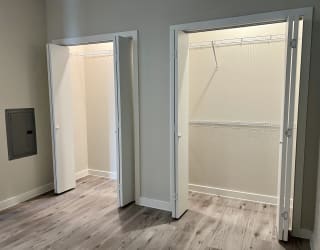 an empty room with an open door