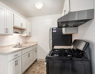 a kitchen with stainless steel appliances at Apple Ridge Apartments, Michigan, 49534