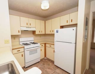 a kitchen with white appliances at Brentwood Park Apartments, La Vista, NE, 68128