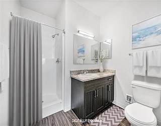 A 2nd bathroom with a sink, toilet, and shower at Copper Creek Apartment Homes, Maize, Kansas