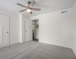 Bedroom with walk in closet at The Crossings Apartments, Michigan, 49508