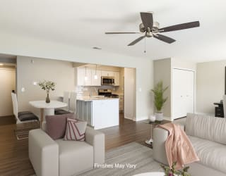 Hillside Wandflower Deluxe Living Room with Den  at Hillside Apartments, Wixom, MI