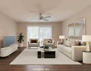 a living room filled with furniture and a large window at Hillside Apartments, Wixom