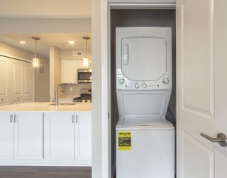 a washer and dryer in a kitchen at Hillside Apartments, Michigan