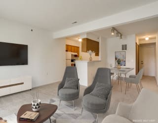 Living and Dining Areas with Kitchen Access at Northport Apartments, Macomb 48044