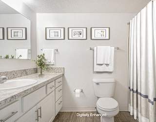 full bathroom with white cabinetry and hard surface flooring at North Pointe Apartments, Indiana, 46514