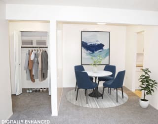 a dining room and a  large closet at Seville Apartments, Michigan, 49009
