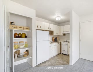 studio kitchen with large closet at Seville Apartments in Kalamazoo, MI 49009