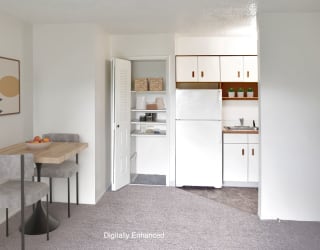 kitchen with a closet at Seville Apartments, Kalamazoo, 49009