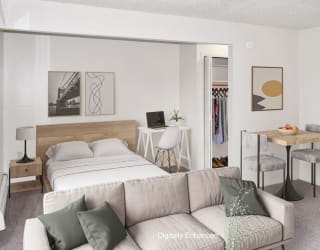 a living room with a sleeping area at Seville Apartments, Kalamazoo, 49009
