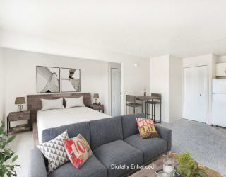 spacious studio living and kitchen areas at Seville Apartments in Kalamazoo, MI 49009