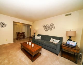 a living room with a couch and a coffee table at Swiss Valley Apartments, Wyoming