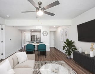 living room with a ceiling fan at The Crossings Apartments, Michigan, 49508