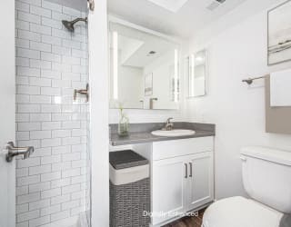 Second bathroom with a walk in shower at The Crossings Apartments, Michigan, 49508