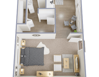 A floor plan of a small apartment with a kitchen, living room, and bedroom.