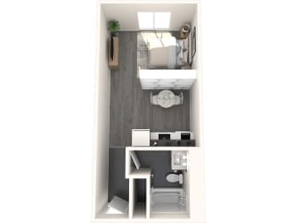 a bedroom with a desk and a chair in a small room