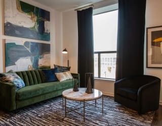 Living Room with deep green accents at The Apex at CityPlace, Overland Park, KS, 66210