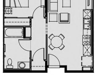 a floor plan of a house with a bedroom and a living room
