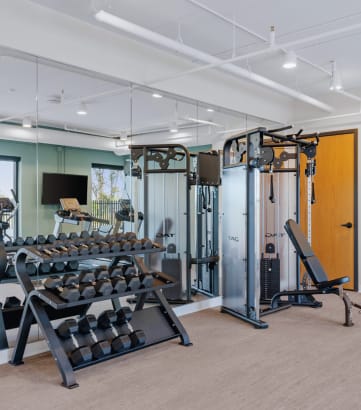 the collection 527 fitness room with cardio equipment