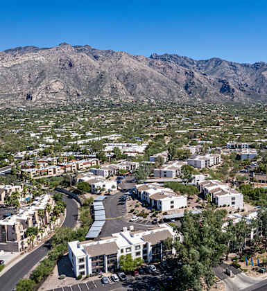 an aerial view of the city of palm springs and the mountains