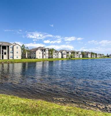 the preserve at ballantyne commons community view of lake with apartment buildings in the background