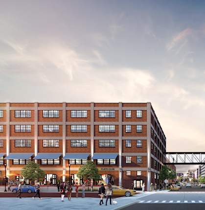 a rendering of a large brick building with a pedestrian walkway in front of it