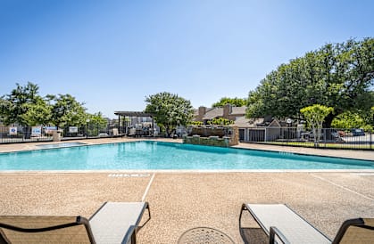 sparkling swimming pool and lounge area available at Summit on the Lake