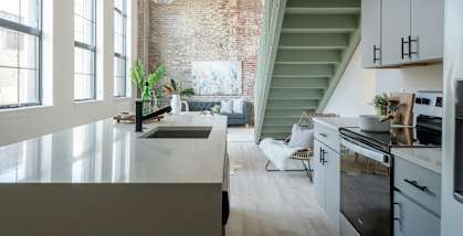 a view from the kitchen into the living room