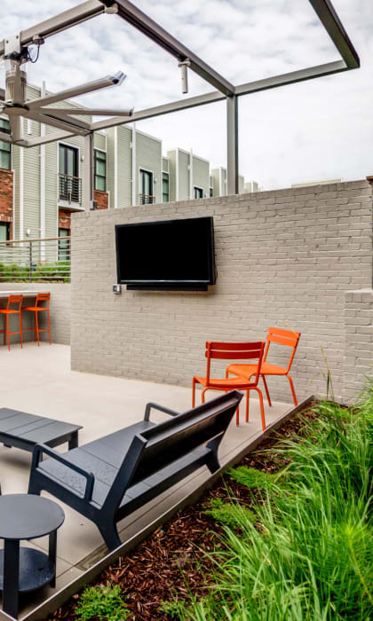 Courtyard Sitting With Shades and TV at 2100 Acklen Flats, Nashville, TN, 37212