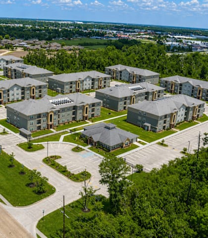 A large group of houses are shown from an aerial view.