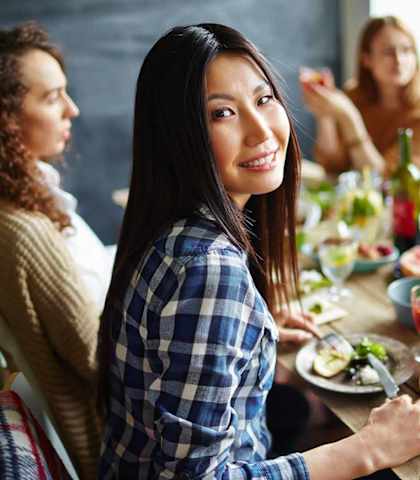 Four people having dinner
