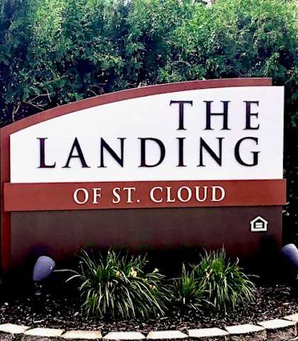 a sign for the landing cloud