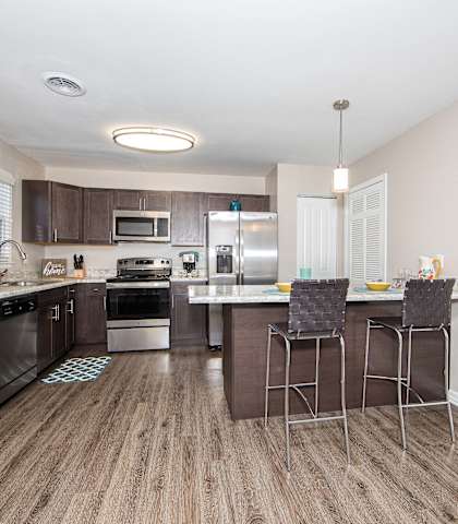 Living Room into Kitchen in Hampstead Heath Luxury Homes in Hampton VA