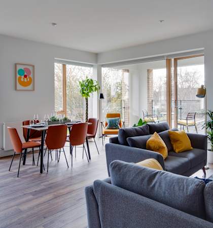 the living room and dining area in slipway 21, a self catering holiday home in rock