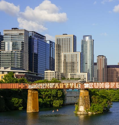 a view of the city with a bridge spelling out the city