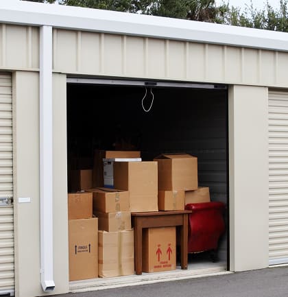 a garage with a bunch of boxes in it