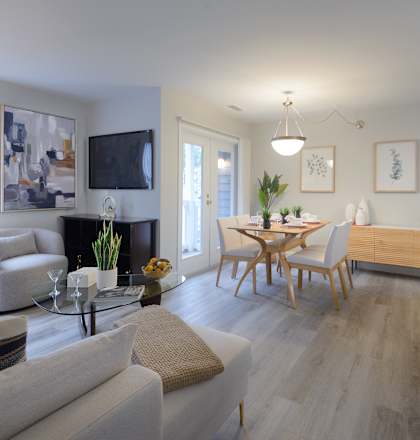 a view of the living room and dining room in a house for sale in atlanta
