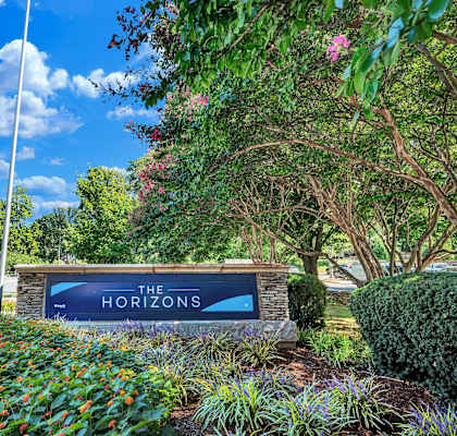 a sign at the entrance of the horizons
