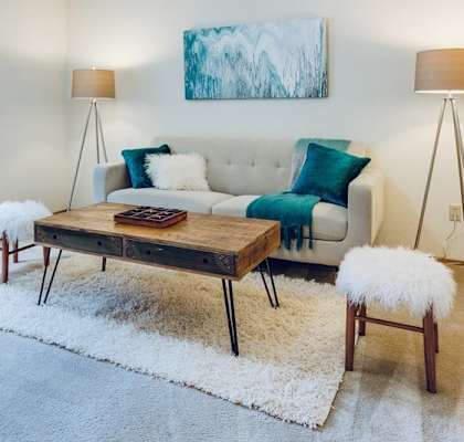 a living room with a couch and a coffee table