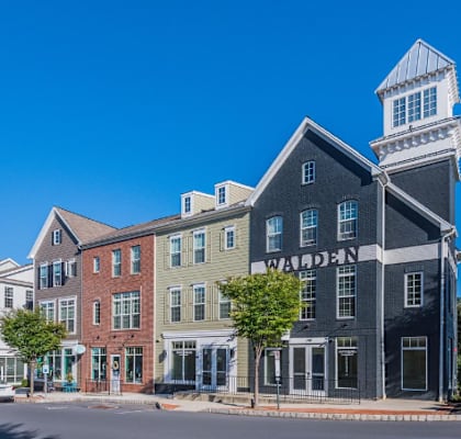 a row of buildings on a street corner