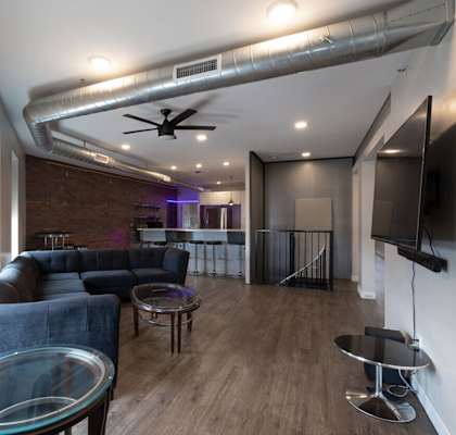 a living room with a couch and a table