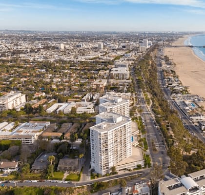 an aerial view of the beach and the city of cape town