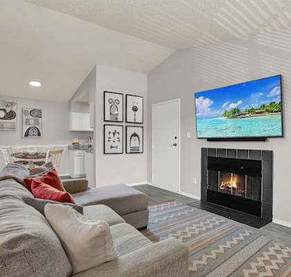 The living room and dining area in the model apartment at Rock Creek Apartments