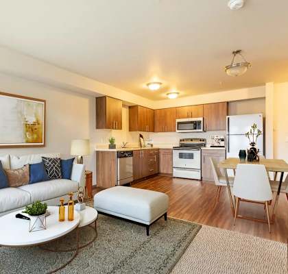 a living room with a couch and a table
