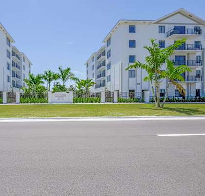 Countyline Apartments in Miami FL photo of community buildings and monument sign