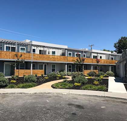 a view of the building from the parking lot